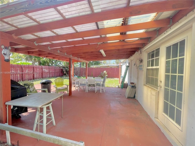 2465 NE 15th Ave, Pompano Beach, FL 33064 - fenced backyard featuring outdoor dining space and a patio