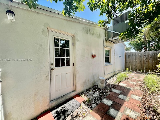 2465 NE 15th Ave, Pompano Beach, FL 33064 - property entrance with stucco siding