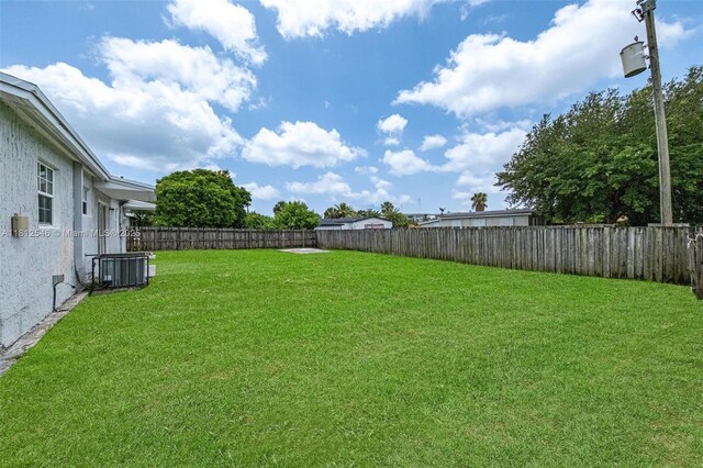 610 Snowden Dr, Lake Worth, FL 33461 - view of yard featuring cooling unit