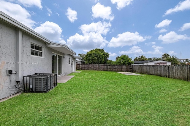 610 Snowden Dr, Lake Worth, FL 33461 - view of yard featuring central air condition unit