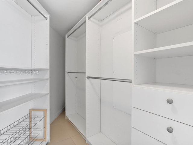 31 SE 6th St Unit 802, Miami, FL 33131 - walk in closet featuring light tile patterned floors