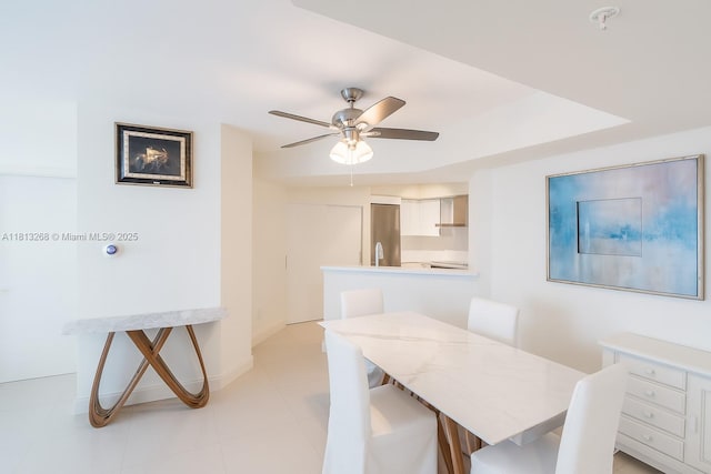 9201 Collins Ave Unit 624, Surfside, FL 33154 - dining room featuring ceiling fan and baseboards