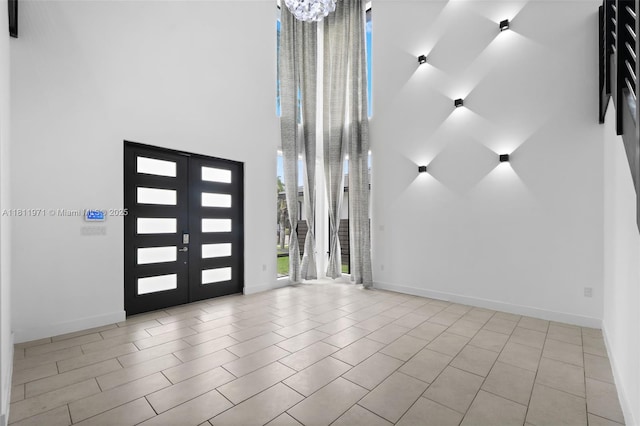 15924 SW 136th Way, Miami, FL 33196 - foyer featuring a high ceiling and a chandelier