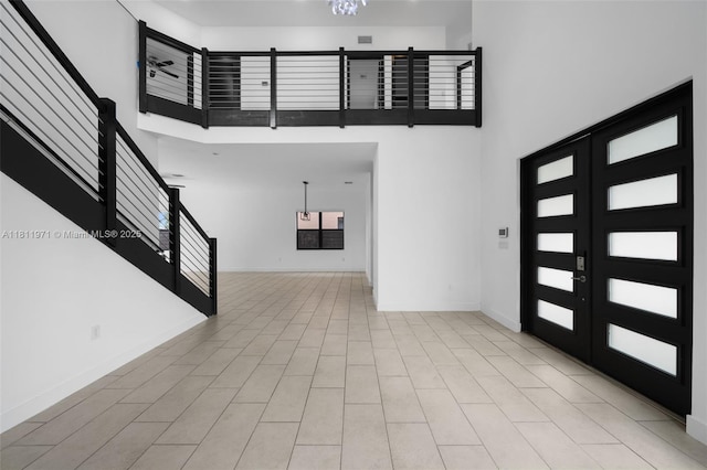 15924 SW 136th Way, Miami, FL 33196 - foyer entrance with a high ceiling and stairs