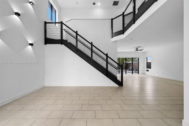 15924 SW 136th Way, Miami, FL 33196 - stairs featuring a towering ceiling, a ceiling fan, tile patterned flooring, and recessed lighting