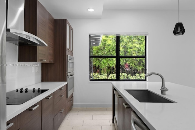 15924 SW 136th Way, Miami, FL 33196 - kitchen featuring wall chimney exhaust hood, black electric stovetop, light countertops, modern cabinets, and recessed lighting