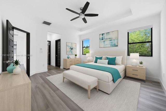 15924 SW 136th Way, Miami, FL 33196 - bedroom with light wood finished floors and a ceiling fan