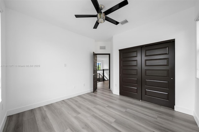 15924 SW 136th Way, Miami, FL 33196 - unfurnished bedroom with light wood-style flooring, a closet, and ceiling fan