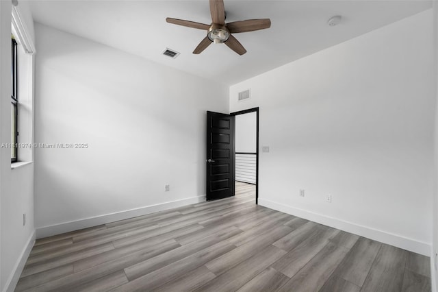 15924 SW 136th Way, Miami, FL 33196 - spare room featuring a ceiling fan and light wood finished floors