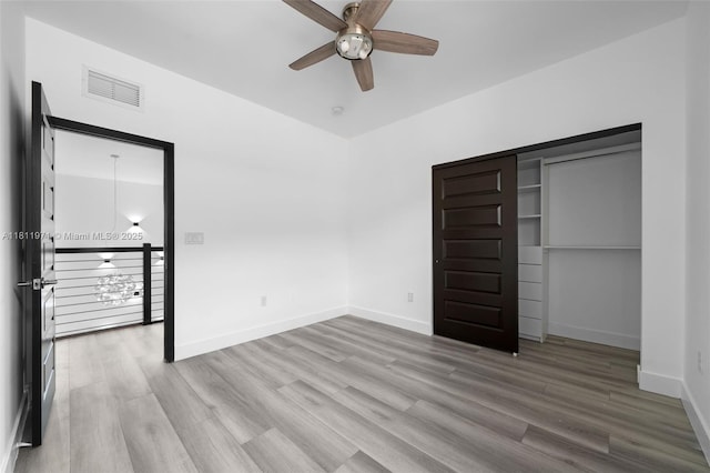 15924 SW 136th Way, Miami, FL 33196 - unfurnished bedroom with wood finished floors and a ceiling fan