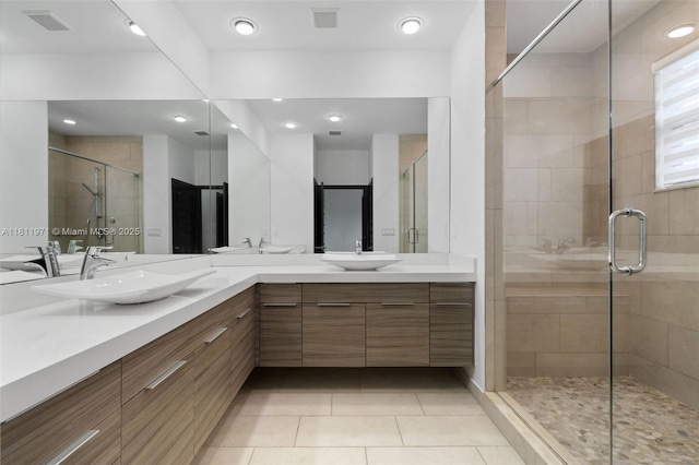 15924 SW 136th Way, Miami, FL 33196 - full bathroom with double vanity, tile patterned flooring, a shower stall, and recessed lighting