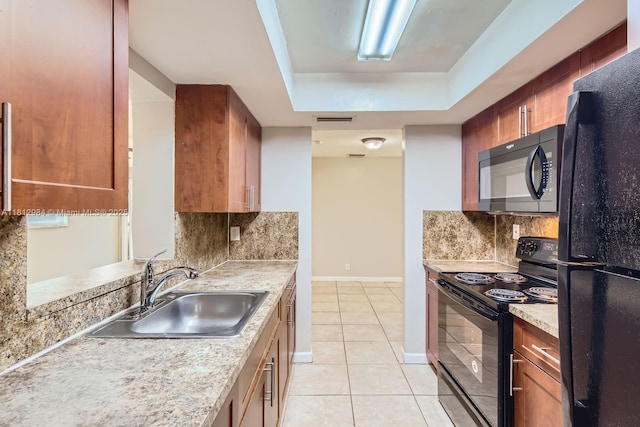 766 NW 35th Ave, Lauderhill, FL 33311 - kitchen with black appliances, a sink, a tray ceiling, light tile patterned flooring, and backsplash