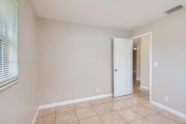 766 NW 35th Ave, Lauderhill, FL 33311 - unfurnished room with light tile patterned floors and baseboards