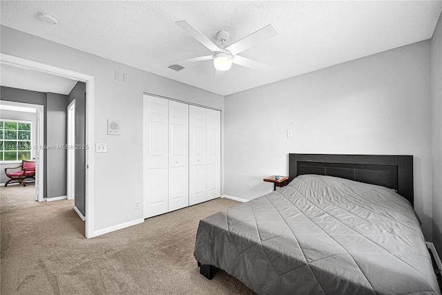 17473 SW 22nd St, Miramar, FL 33029 - bedroom featuring carpet floors, baseboards, a closet, and a textured ceiling