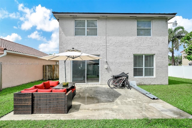 17473 SW 22nd St, Miramar, FL 33029 - rear view of house featuring stucco siding, an outdoor hangout area, and a patio