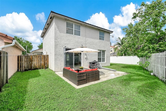 17473 SW 22nd St, Miramar, FL 33029 - rear view of house featuring stucco siding, a patio, and an outdoor hangout area