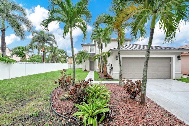 17473 SW 22nd St, Miramar, FL 33029 - view of front of property with stucco siding, an attached garage, concrete driveway, and a standing seam roof