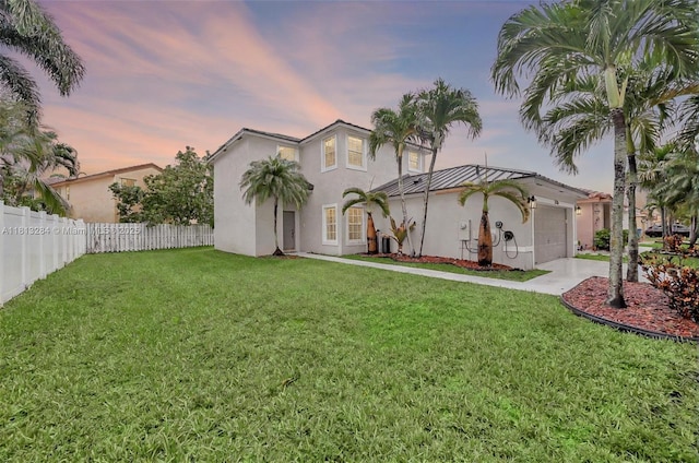 17473 SW 22nd St, Miramar, FL 33029 - view of front of house featuring stucco siding, an attached garage, and concrete driveway