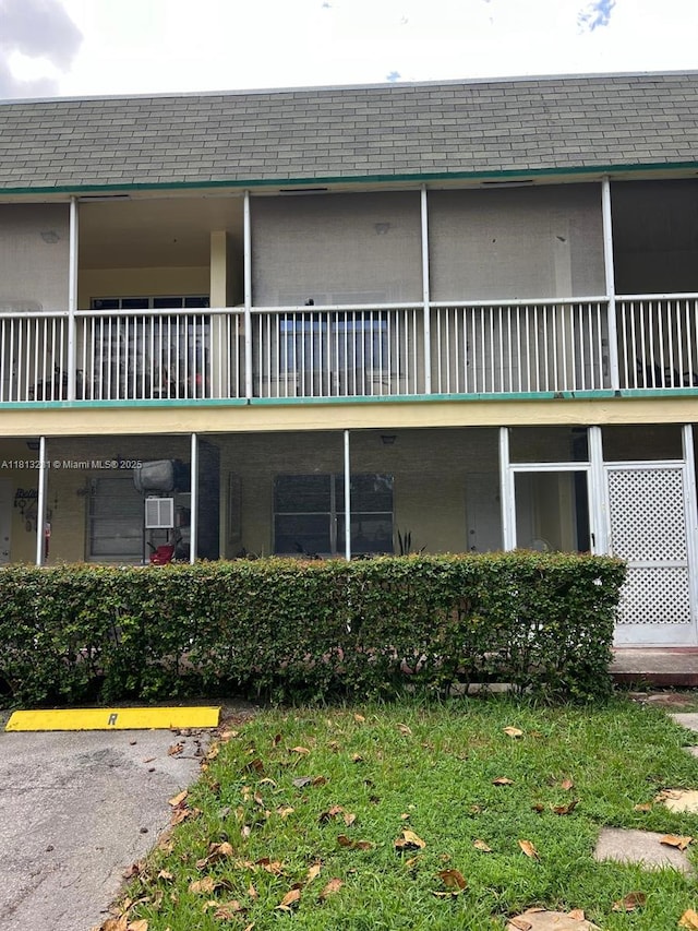 2905 Pierce St Unit 7, Hollywood, FL 33020 - view of building exterior with uncovered parking