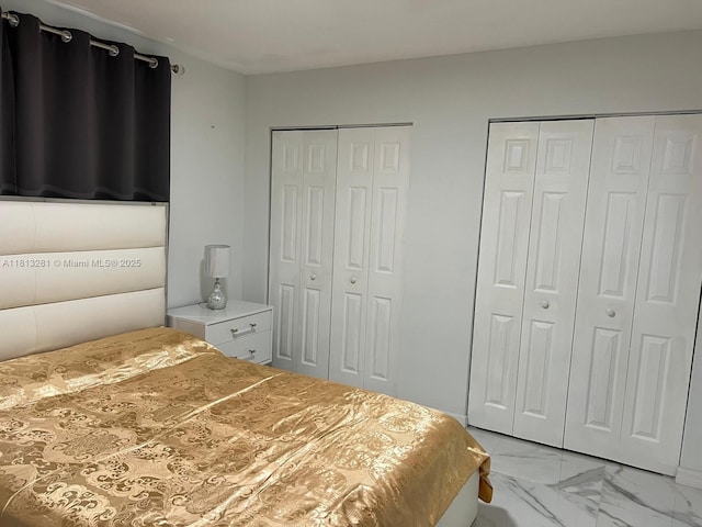 2905 Pierce St Unit 7, Hollywood, FL 33020 - bedroom with two closets and light marble finish floors