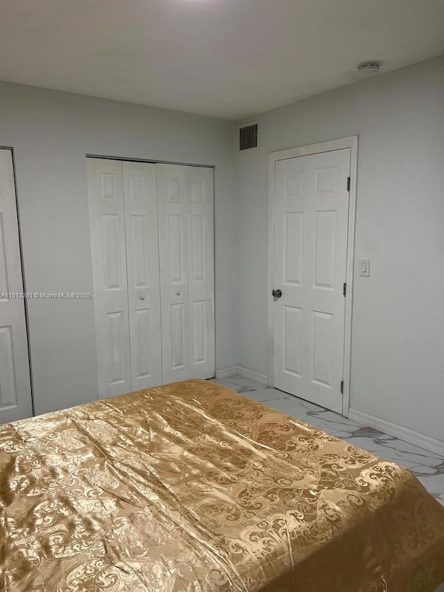 2905 Pierce St Unit 7, Hollywood, FL 33020 - unfurnished bedroom featuring baseboards and marble finish floors