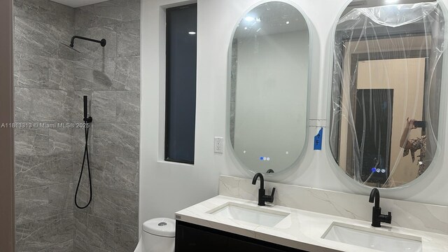 14074 Whittier Prt, Charlotte, FL 33981 - full bath with double vanity, tiled shower, and toilet