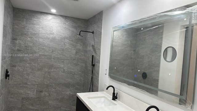14074 Whittier Prt, Charlotte, FL 33981 - bathroom with vanity and tiled shower