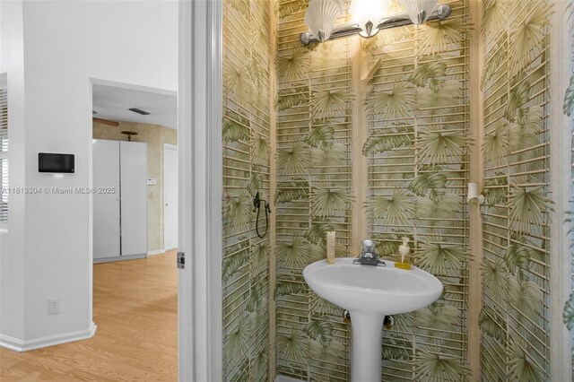 9280 Boca Gardens Pkwy Unit B, Boca Raton, FL 33496 - bathroom with wood finished floors and baseboards