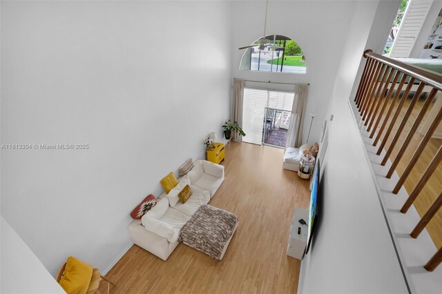 9280 Boca Gardens Pkwy Unit B, Boca Raton, FL 33496 - entrance foyer with wood finished floors, a high ceiling, and stairs