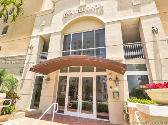 2425 SW 27th Ave Unit 705, Miami, FL 33145 - view of exterior entry featuring french doors