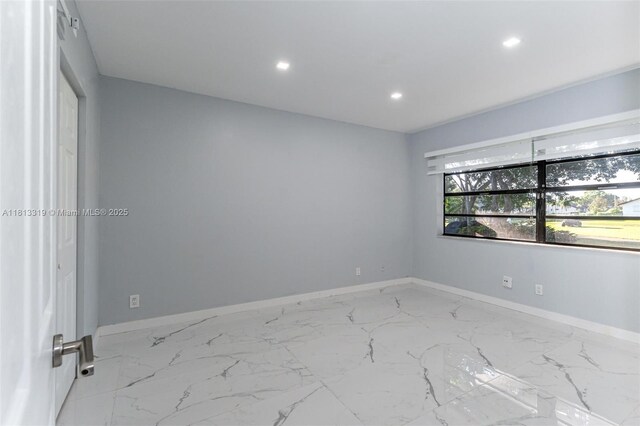 9234 Wedgewood Ln Unit D7, Tamarac, FL 33321 - spare room featuring marble finish flooring, recessed lighting, and baseboards