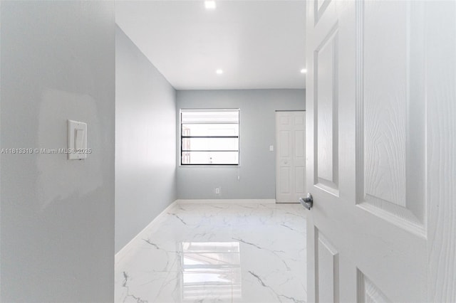 9234 Wedgewood Ln Unit D7, Tamarac, FL 33321 - empty room featuring baseboards, marble finish flooring, and recessed lighting