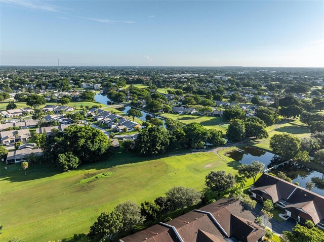 9234 Wedgewood Ln Unit D7, Tamarac, FL 33321 - aerial overview of property's location with nearby suburban area, a golf course, and a large body of water