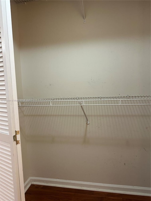 4828 N State Road 7 Unit 8107, Coconut Creek, FL 33073 - walk in closet with wood finished floors