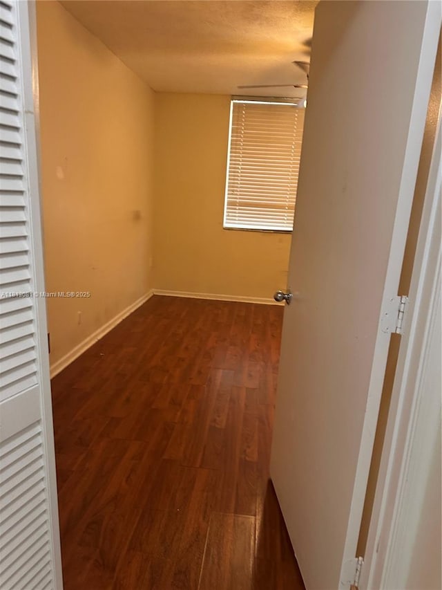 4828 N State Road 7 Unit 8107, Coconut Creek, FL 33073 - spare room with wood finished floors and baseboards