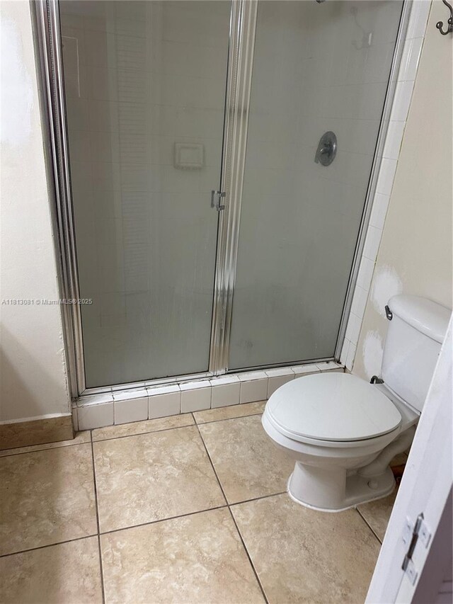 4828 N State Road 7 Unit 8107, Coconut Creek, FL 33073 - full bath featuring toilet, a shower stall, and tile patterned floors