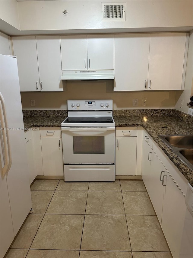 4828 N State Road 7 Unit 8107, Coconut Creek, FL 33073 - kitchen with white appliances, under cabinet range hood, white cabinets, light tile patterned floors, and a sink