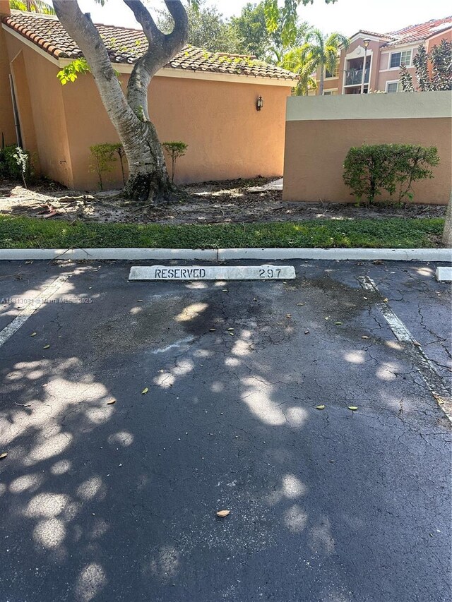 4828 N State Road 7 Unit 8107, Coconut Creek, FL 33073 - view of uncovered parking lot