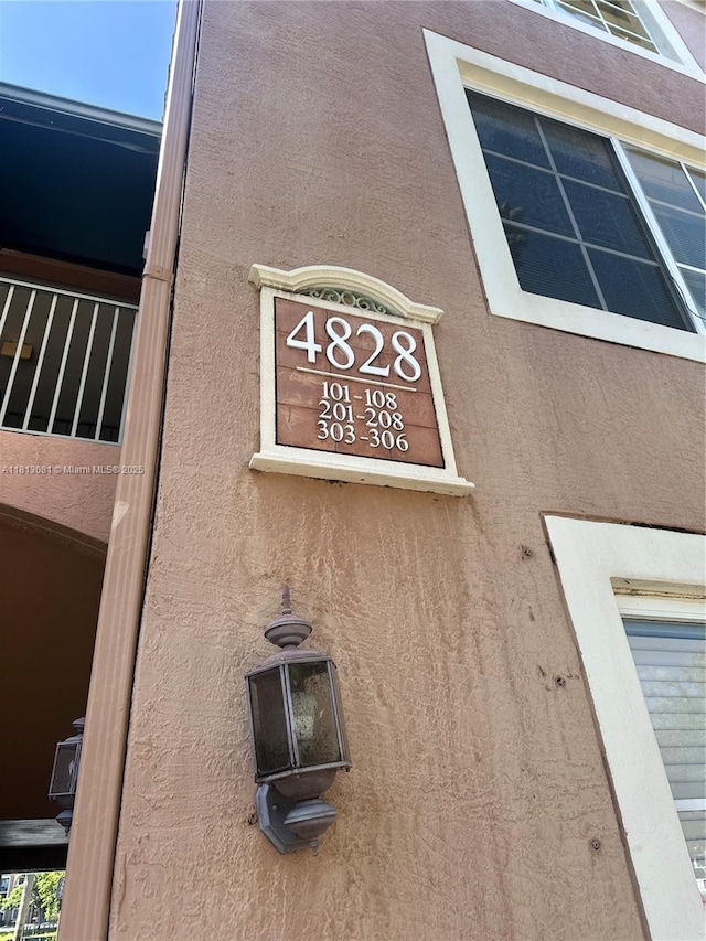 4828 N State Road 7 Unit 8107, Coconut Creek, FL 33073 - exterior view of stucco siding