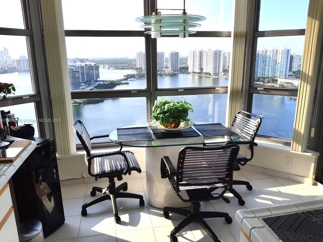 3530 Mystic Pointe Dr Unit 3001, Aventura, FL 33180 - tiled dining room with a city view, plenty of natural light, and a water view