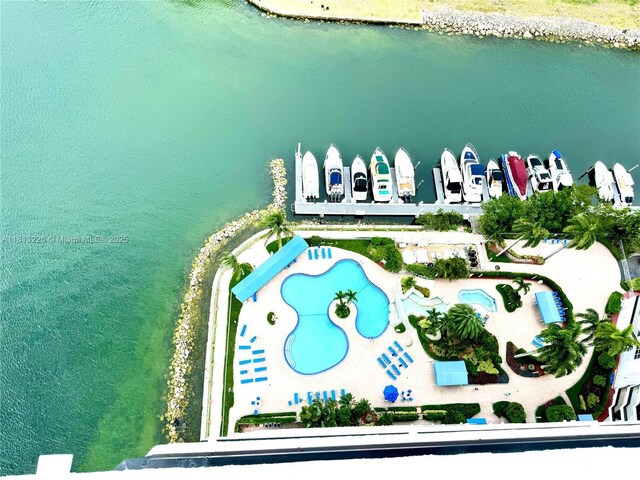 3530 Mystic Pointe Dr Unit 3001, Aventura, FL 33180 - drone / aerial view of a large body of water and a pool area