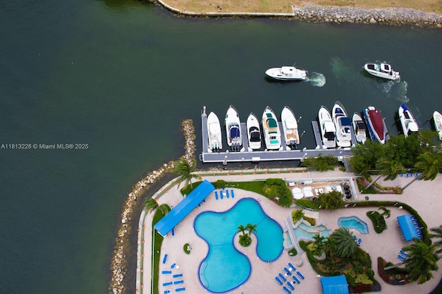 3530 Mystic Pointe Dr Unit 3001, Aventura, FL 33180 - drone / aerial view of a nearby body of water and a pool area