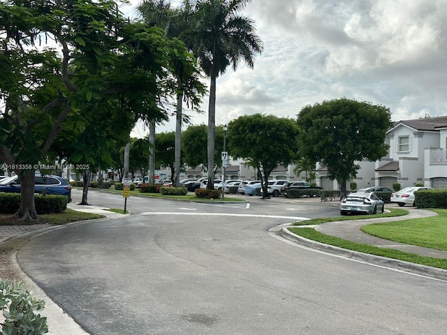 11281 NW 42nd Ter Unit 0, Doral, FL 33178 - view of street with curbs and a residential view