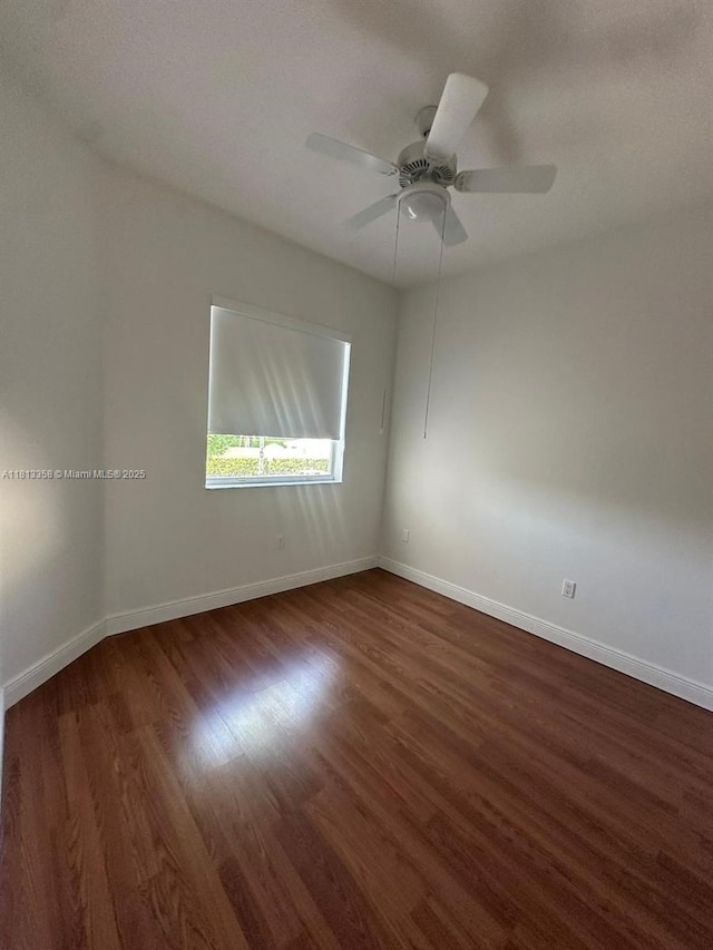 11281 NW 42nd Ter Unit 0, Doral, FL 33178 - spare room with wood finished floors, baseboards, and ceiling fan