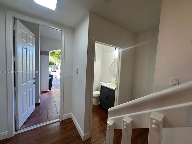 11281 NW 42nd Ter Unit 0, Doral, FL 33178 - hallway with dark wood-style floors and baseboards