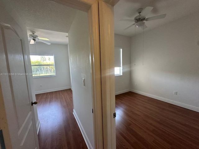 11281 NW 42nd Ter Unit 0, Doral, FL 33178 - hall featuring wood finished floors and baseboards