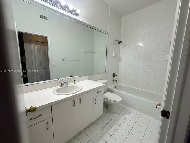 11281 NW 42nd Ter Unit 0, Doral, FL 33178 - bathroom with tile patterned floors, vanity, toilet, and washtub / shower combination