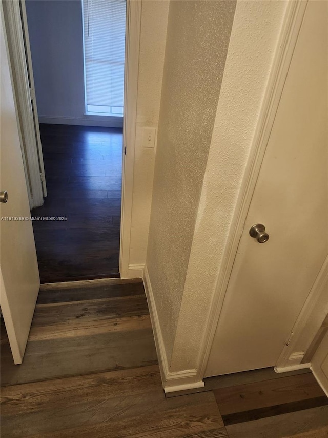 833 Riverside Dr Unit 834, Coral Springs, FL 33071 - stairway with wood finished floors, a textured wall, and baseboards