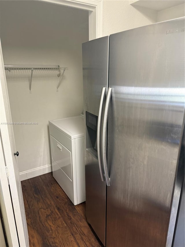 833 Riverside Dr Unit 834, Coral Springs, FL 33071 - laundry room featuring washer / clothes dryer and dark wood-style flooring