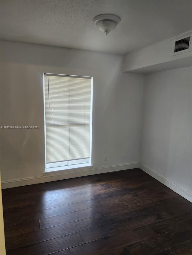 833 Riverside Dr Unit 834, Coral Springs, FL 33071 - empty room with baseboards and dark wood finished floors